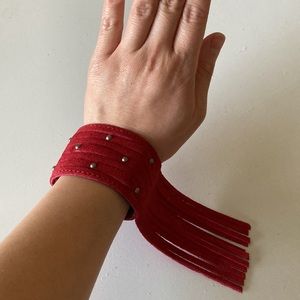 Minnetonka leather fringe and stud snap on bracelet, Red